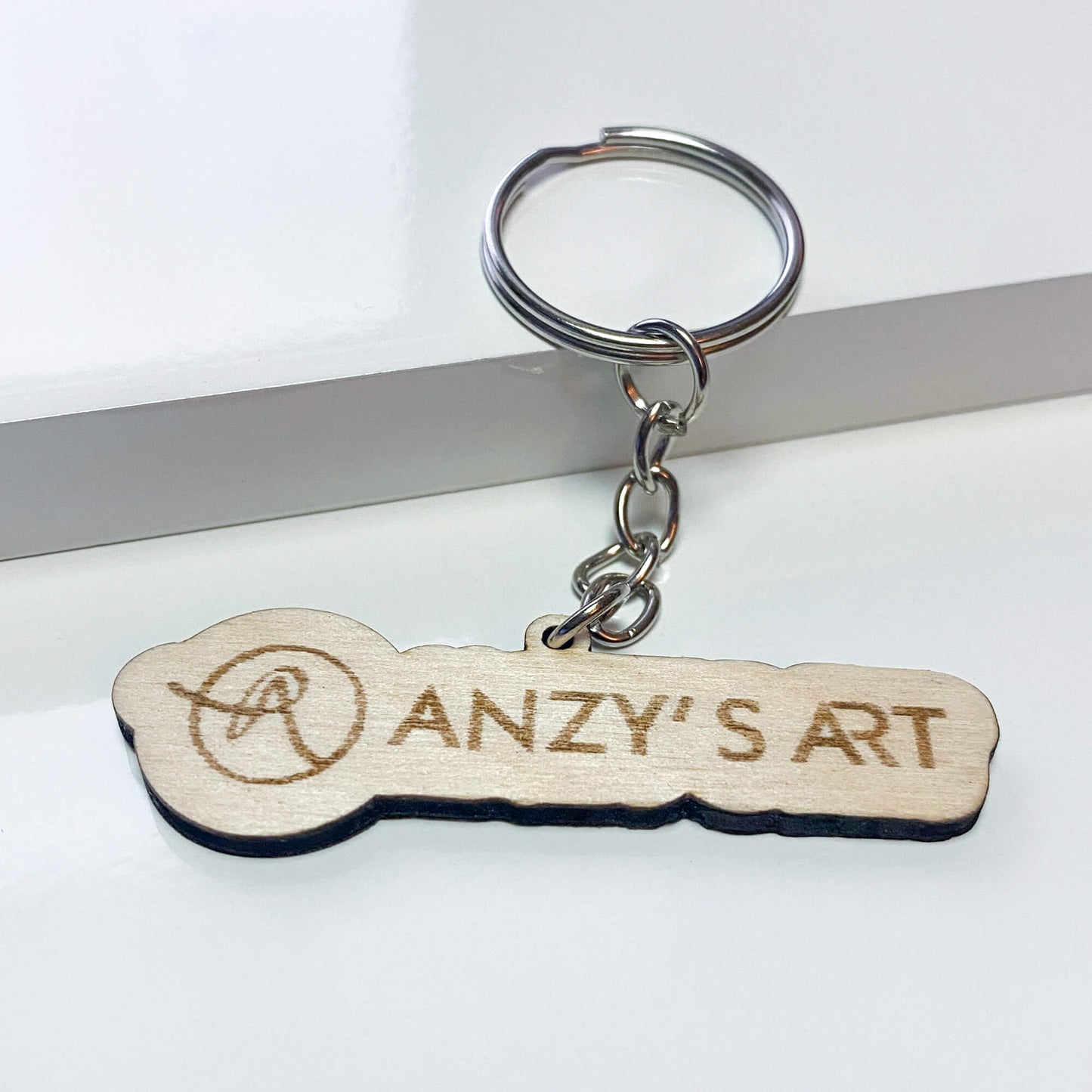Custom Holz-Schlüsselanhänger – freie Form & Gravur inklusive